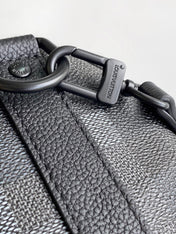 LV 25S KEEPALL BANDOULIÈRE 25 BAG IN DAMOFLAGE BLACK CALFSKIN