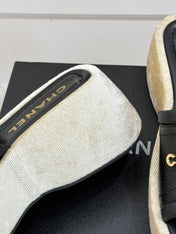 PLATFORM SLIPPERS IN BLACK LAMBSKIN