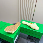 BLINK FLAT MULE IN PASTEL YELLOW INTRECCIATO LEATHER