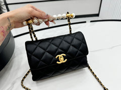 CHANEL 25S FLAP BAG 19 CM IN BLACK LAMBSKIN WITH PEARL TOP HANDLE