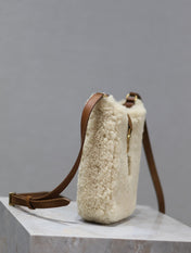 LE 5 À 7 HOBO BAG 18 IN CREAM SHEARLING AND BROWN SUEDE TRIM