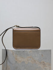 YSL 25S NIKI BABY 22 IN BROWN CALFSKIN GOLD HARDWRE