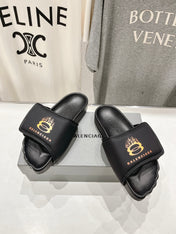 SLIDE SANDALS IN BLACK NYLON AND RUBBER YELLOW PRINT