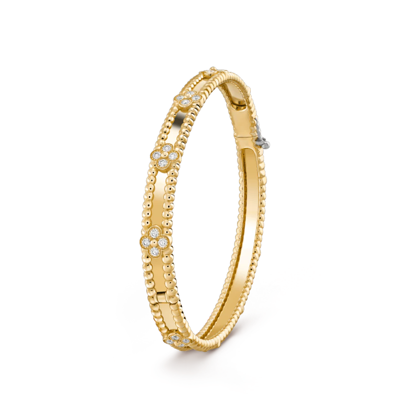 van-cleef-arpels-perlee-sweet-clovers-bracelet-yellow-gold-diamond-vcarp6x700-1_da1a183a-fe6b-43fe-a8ab-a8188fe02142.png